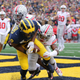 Michigan and Ohio State football programs each took in more than $100 million last year.